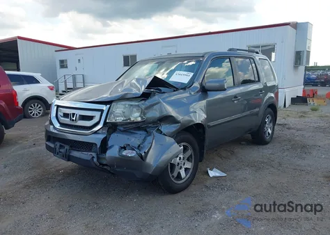 2009 Honda Pilot Touring z USA, uszkodzony, nr VIN 5FNYF48919B054921